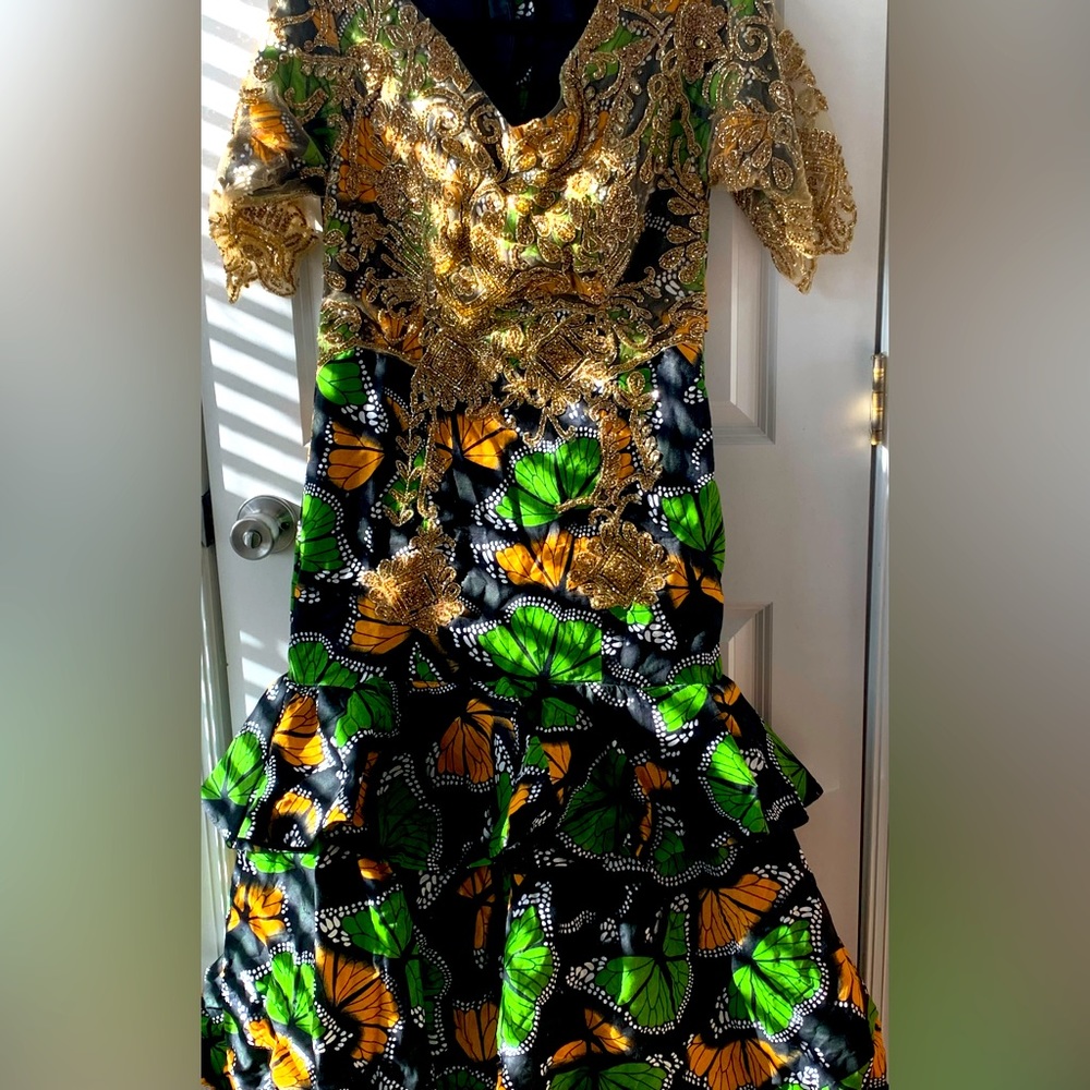 Green and orange butterfly print dress with beaded appliqué